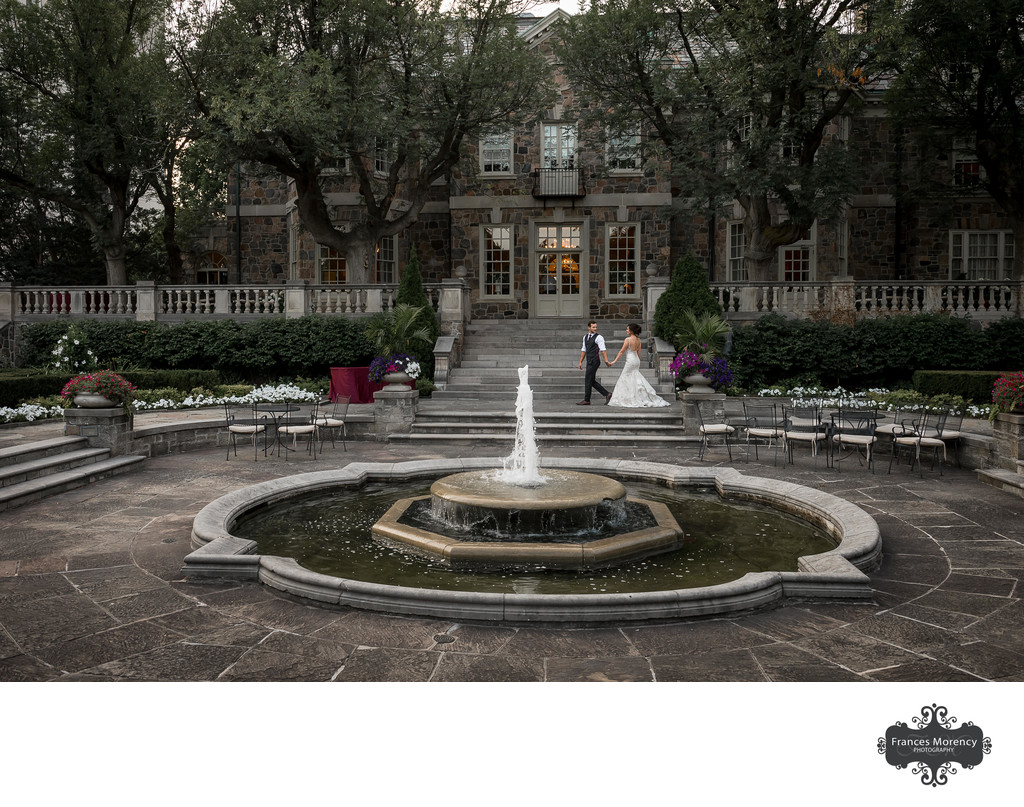 Couple Walking in Front of Fountain at Graydon Hall