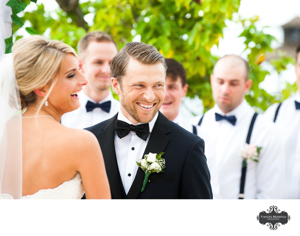 Groom Laughing During Ceremony:  Destination Wedding 