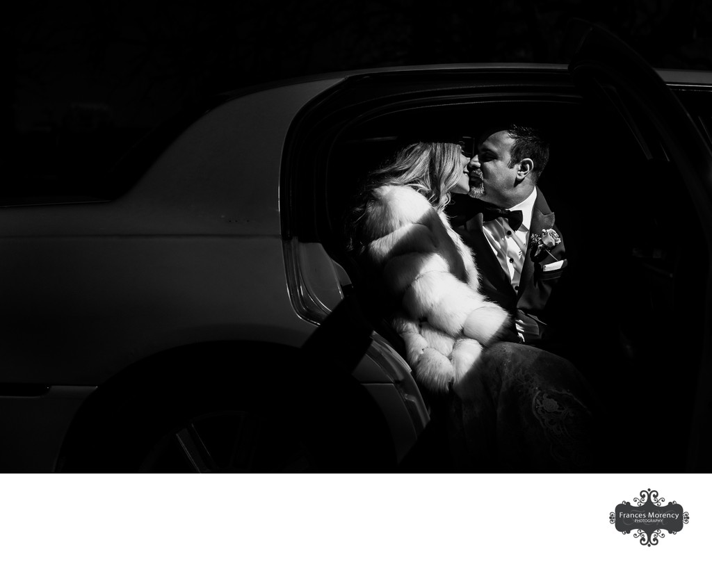 Bride Groom Kissing in Limo with Harsh Light