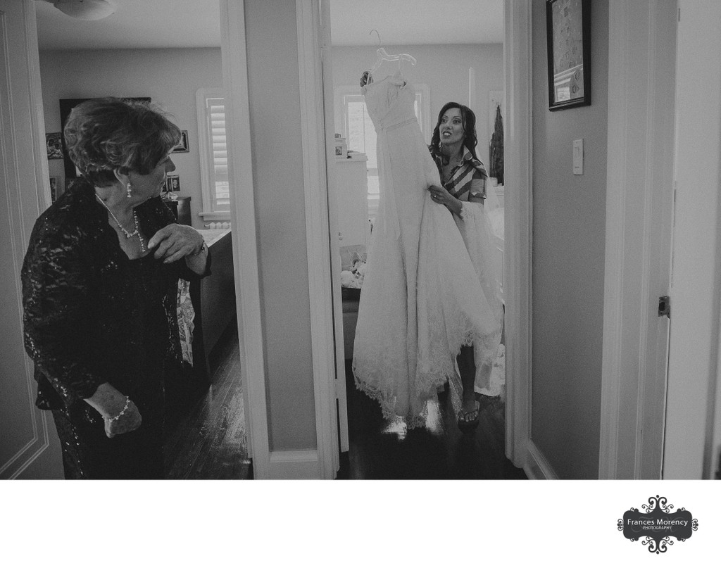 Bride Carries Dress While Mom Cries:  Photojournalism 