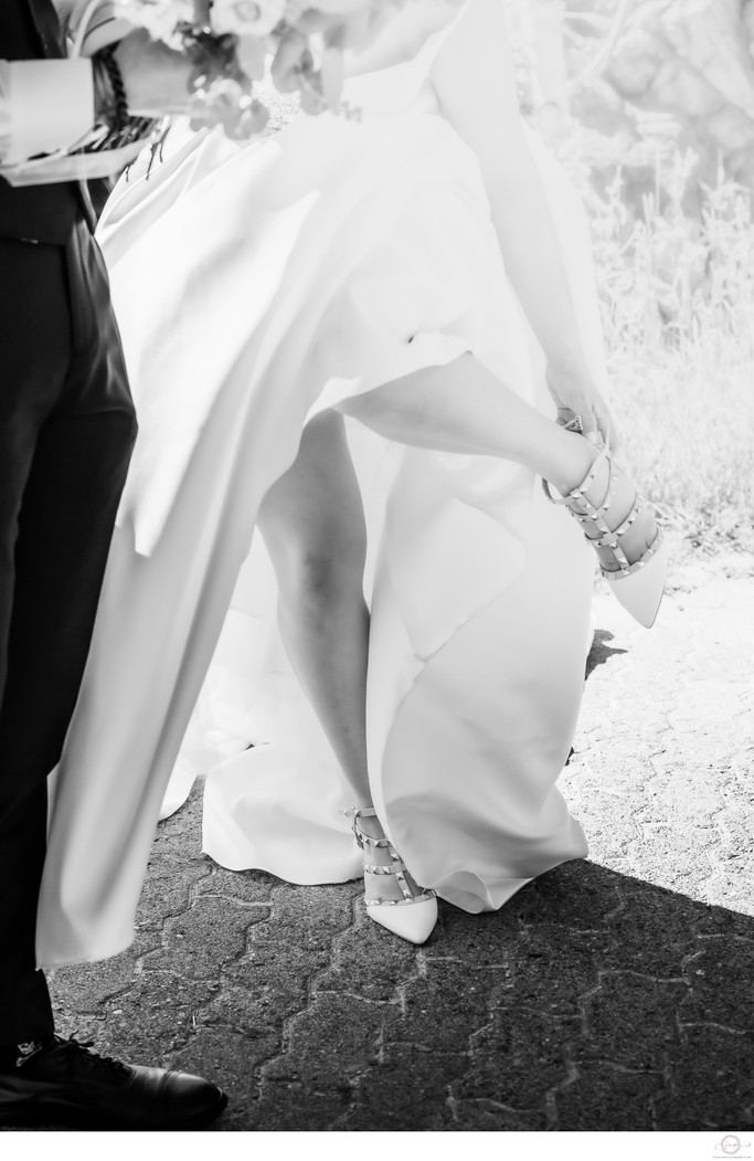 Bride Takes Off Shoes:  Black and White Photographer