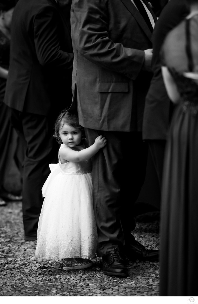 Flower Girl Portrait While Hanging On to Dads Leg