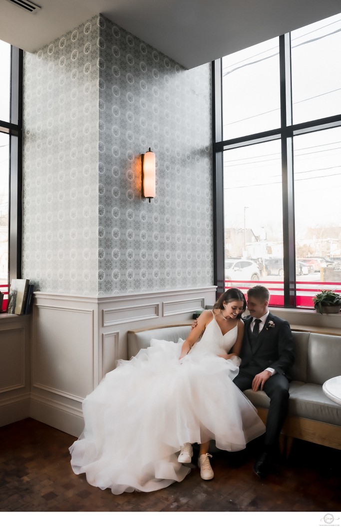 Bride Groom Sitting on Window Bench at Broadview Hotel Wedding