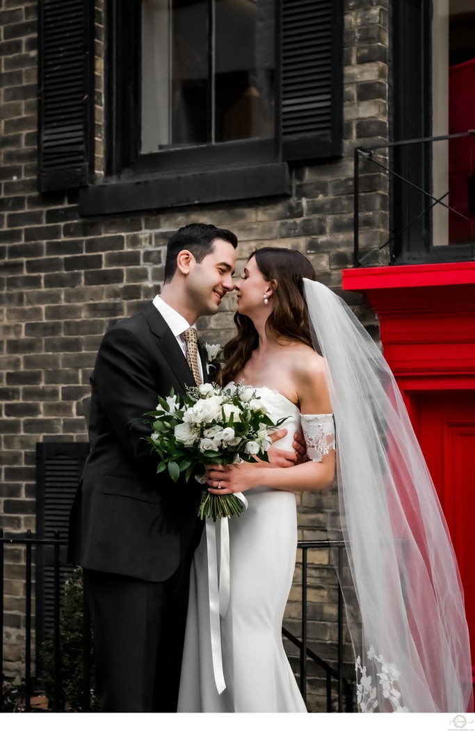 Couple Portrait with a Pop of Red from a Door in Yorkville