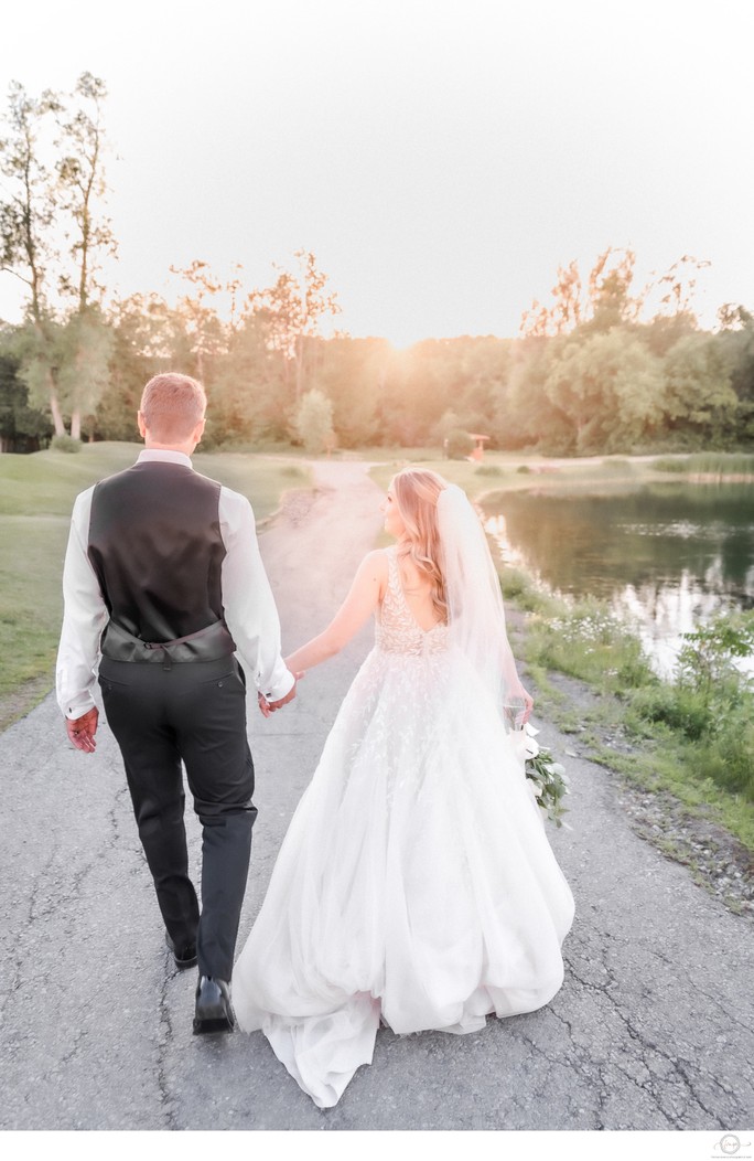 Hockley Valley Resort Wedding Couple Walking Towards Sunset