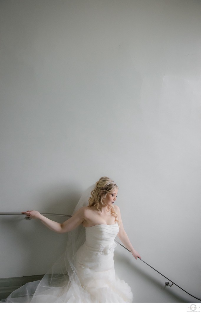 Bride Portrait on Staircase with Window Light