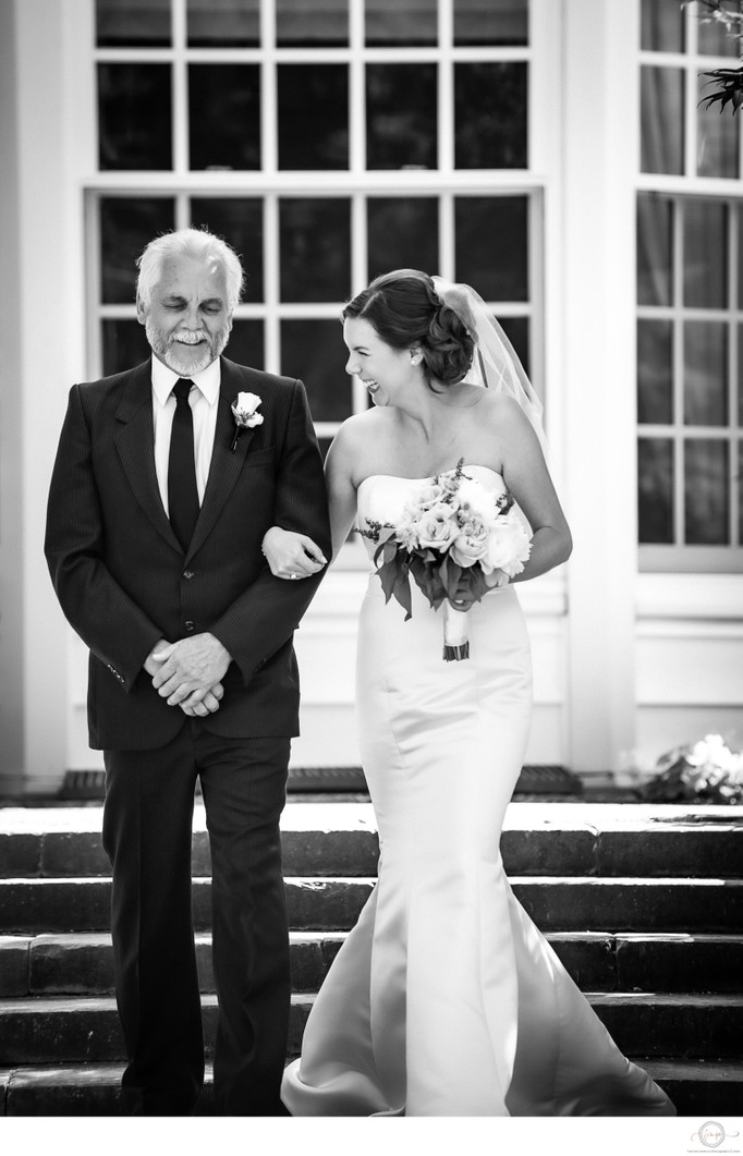 Father Daughter Walking Down Aisle and Laughing