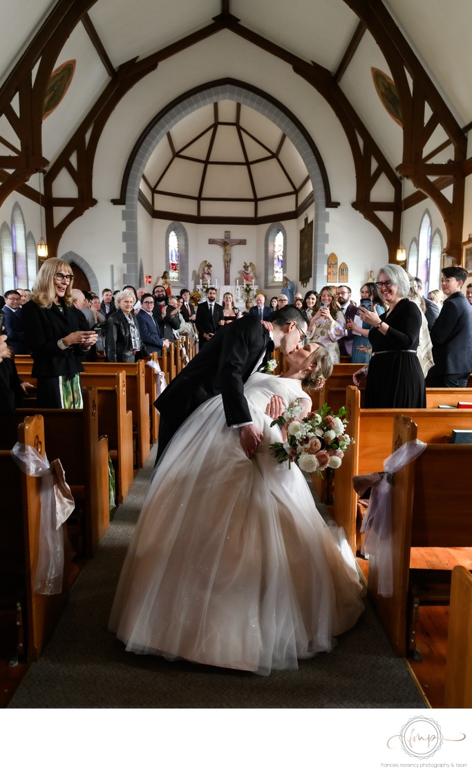 Groom Dips & Kisses Bride at Church Ceremony Exit