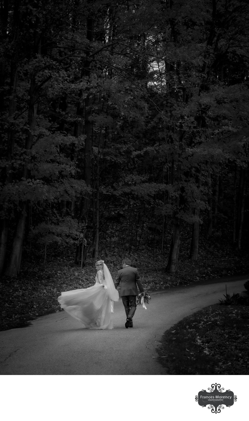 Photojournalism Capture of Bride Playing with Dress