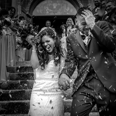 Greek Ceremony Exit:  Black and White Wedding Photographer