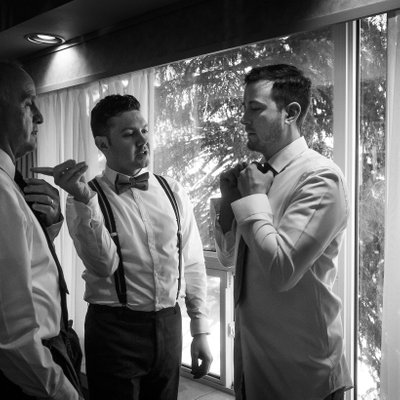 Tie Tying Lesson:  Black and White Wedding Photographer