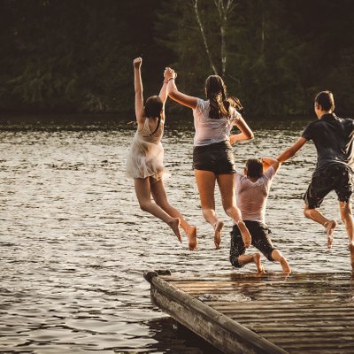 Kids Jump Off Dock:  Blue Mountain Family Photographer