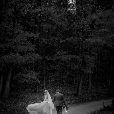 Photojournalism Capture of Bride Playing with Dress