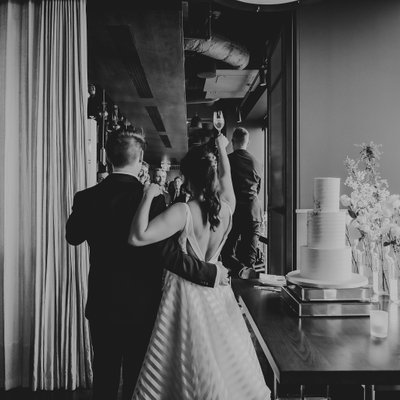 Couple Toasting Guest:  Toronto Wedding Photographer