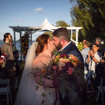 Kiss During Ceremony Exit:  Collingwood Wedding Photographer