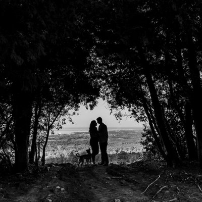Silhouette Photo of Couple with Dog at Blue Mountain