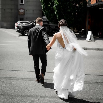 Bride Groom Walking Across Street at Cellar 52 Wedding