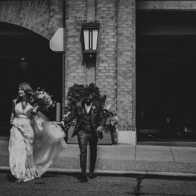 Groom Escorts Bride Across Toronto Street