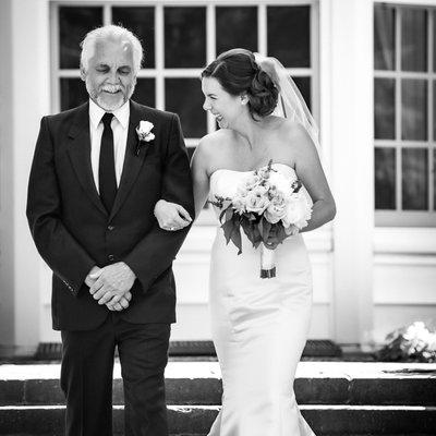 Father Daughter Walking Down Aisle and Laughing