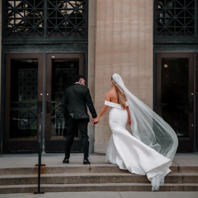 Interracial Couple Entering Liuna Station Wedding