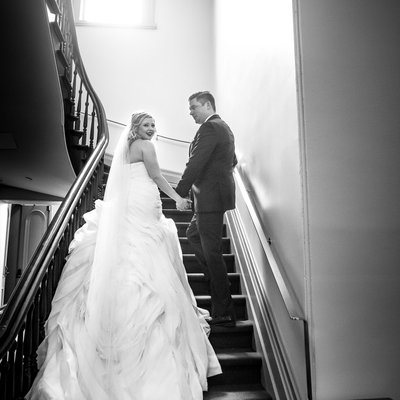 Bride Groom Walking Up Staircase at Brampton Wedding Venue