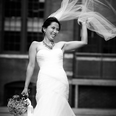 Bride on Windy Day with Veil:  Mildreds Temple Kitchen Wedding