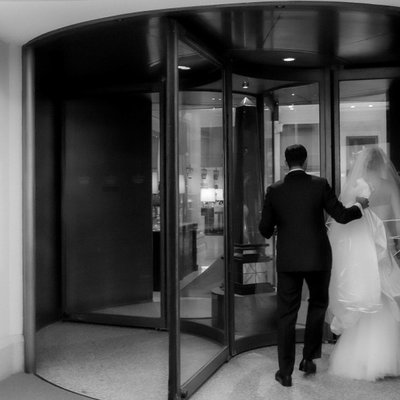 Bride Groom Walking Into Omni King Edward Hotel Toronto
