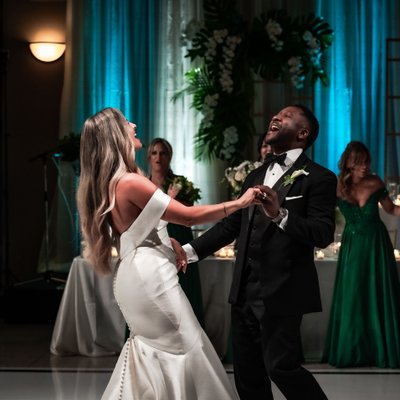 Interracial Couple Singing at First Dance