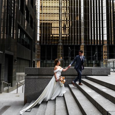 Wedding Couple Portrait on Steps of Toronto Buildiing