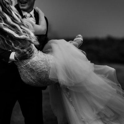 Groom Picks Up Bride During Ceremony Exit