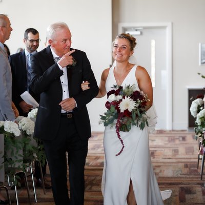 Father Daughter Walking Down Aisle At Alpine Ski Club