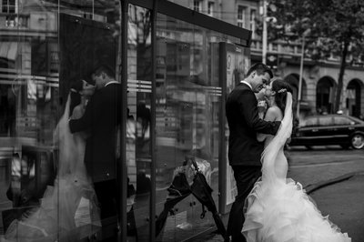Bride Groom Kiss by Bus Stop:  Black and White Photographer
