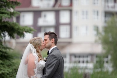 Kissing in Blue Mountain:  Unposed Wedding Photographer