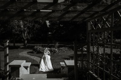 Bride Running in Garden Light:  Millcroft Inn Wedding 