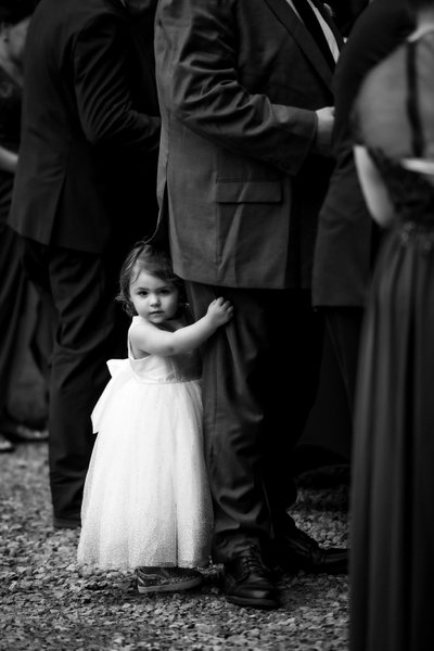 Flower Girl Portrait While Hanging On to Dads Leg