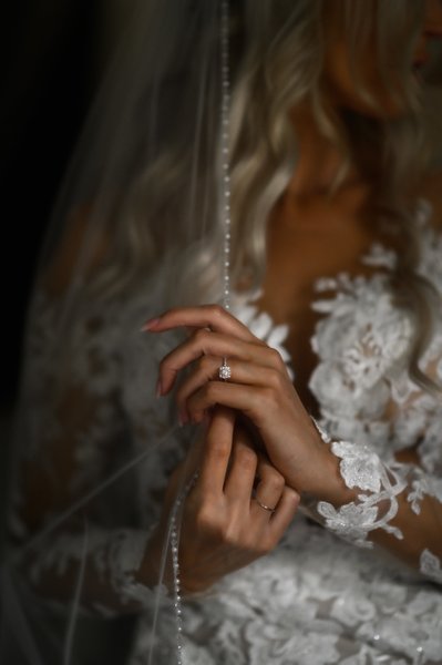 Engagement Ring Photo with Bride Holding Veil