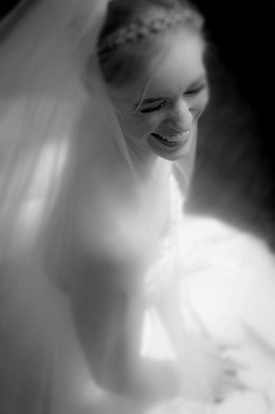 Giggling During Bridal Portrait at The Omni King Edward