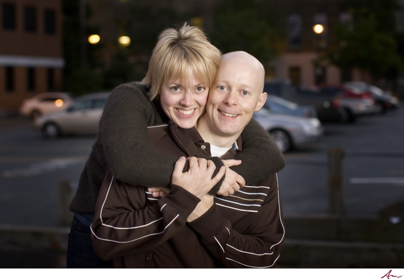 Engagement Session couple hugging and smiling 