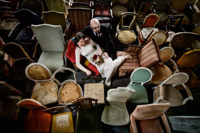 Bride and Groom on Antique Chairs
