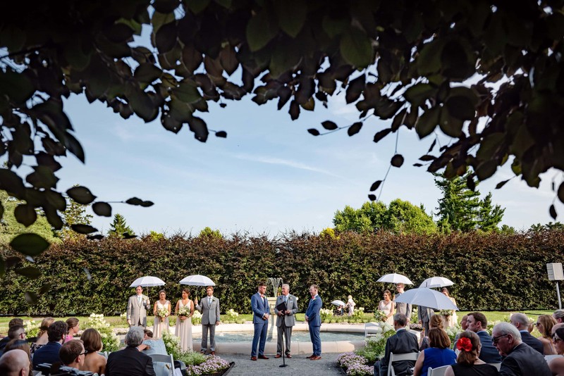 Wedding ceremony under a bright sky at Elm Bank weddings