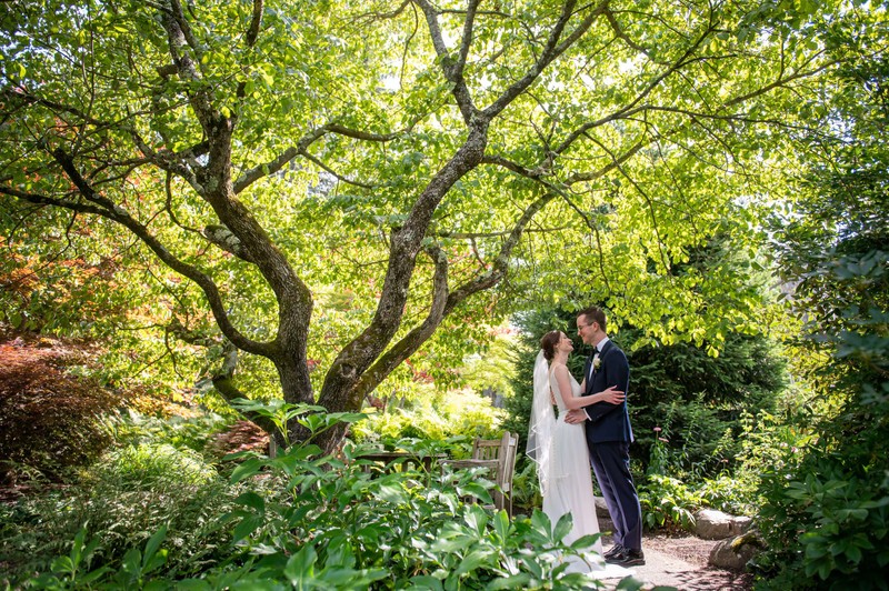 Bride and groom among the beautiful landscape at Elm Bank weddings