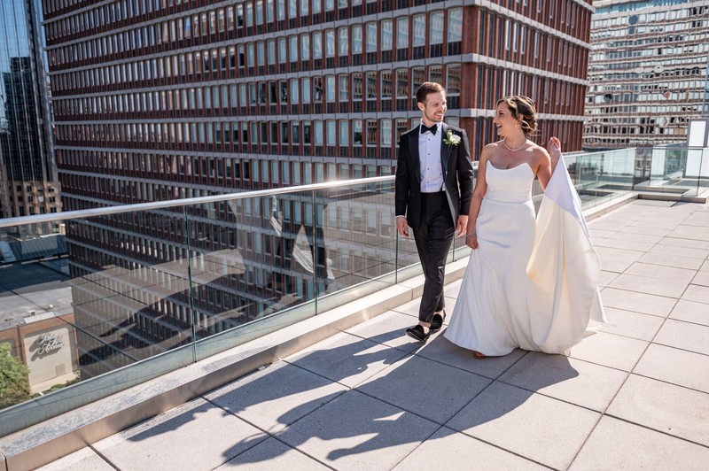 A wedding couple's rooftop stroll at the Mandarin Oriental, Boston