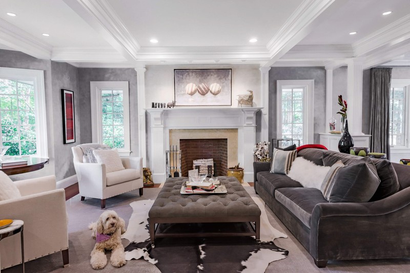 Transitional living room with stone fireplace and sectional