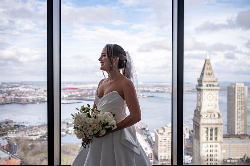 Bride portrait at State Room Boston overlooking the city