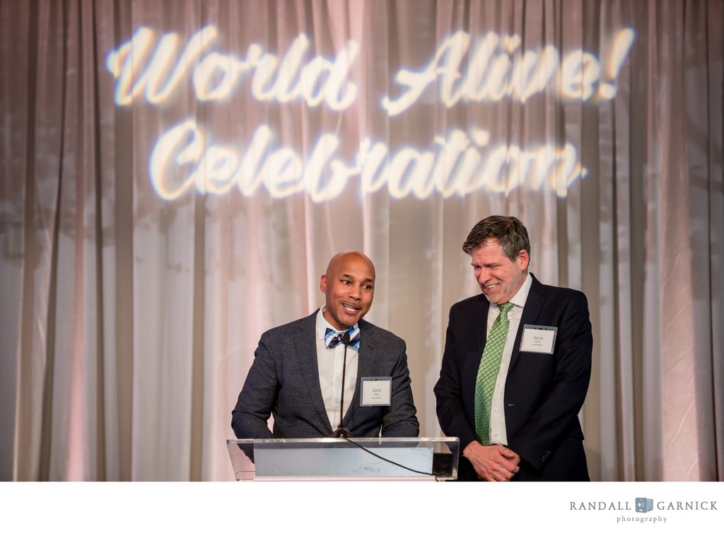 Award ceremony speakers photographed in Boston venue