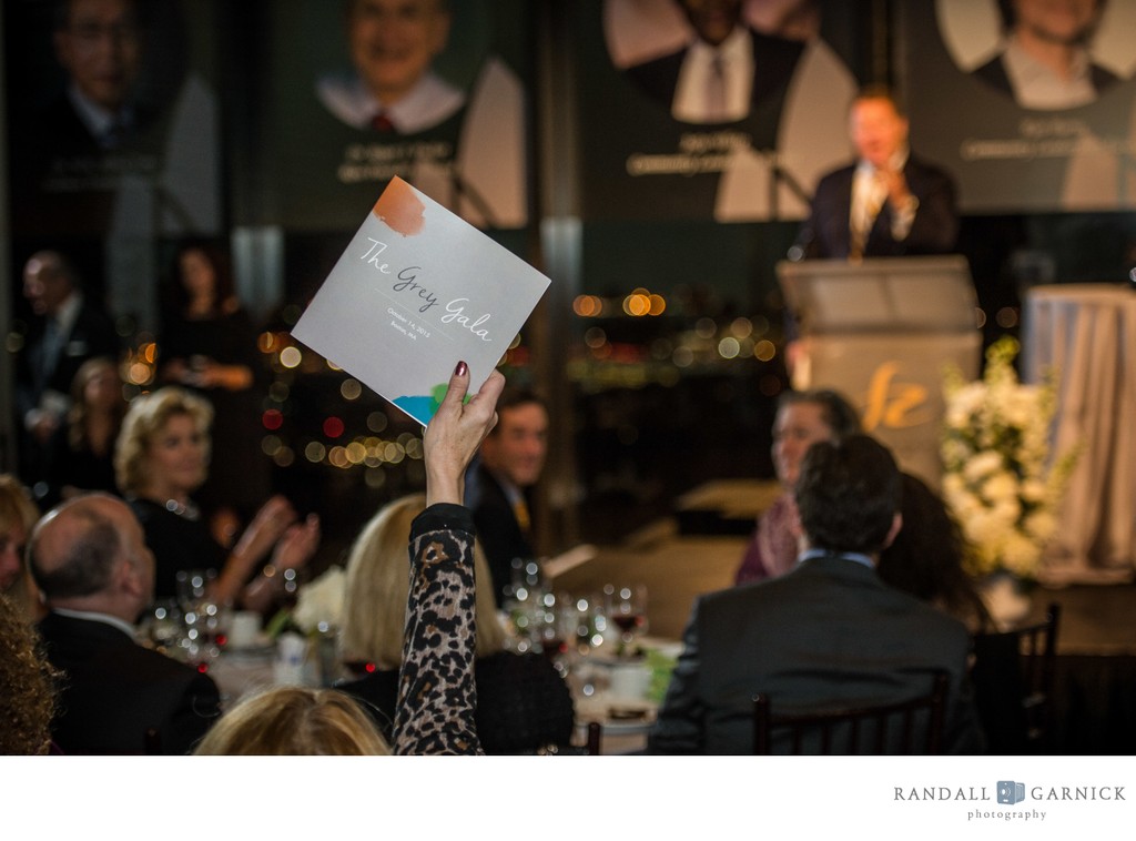 Live auction moment at Boston charity event