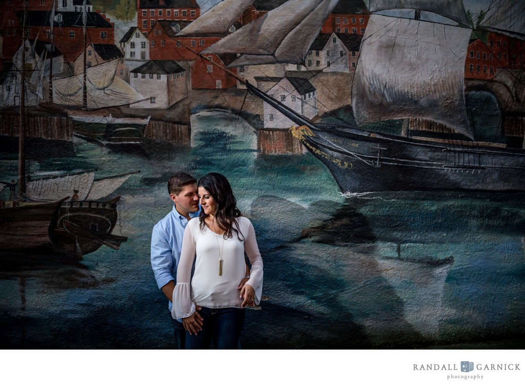 Newburyport engagement photos with historic mural
