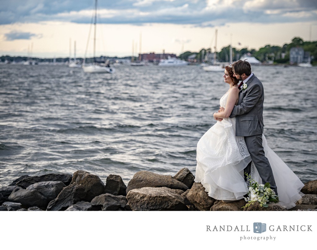 Couple by waterfront Blithewold Mansion wedding portraits