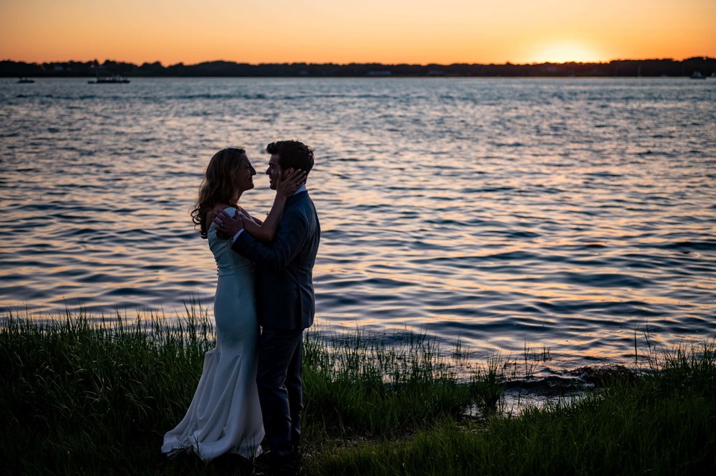 Sunset kiss by water Blithewold Mansion wedding