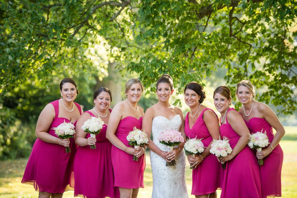 Bridesmaids smiling in garden Blithewold Mansion wedding